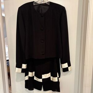 Wonderful jacket with matching skirt with fun details!